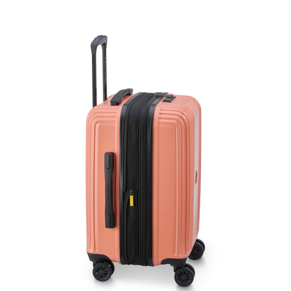 Side view of Delsey coral pink suitcase with side handle
