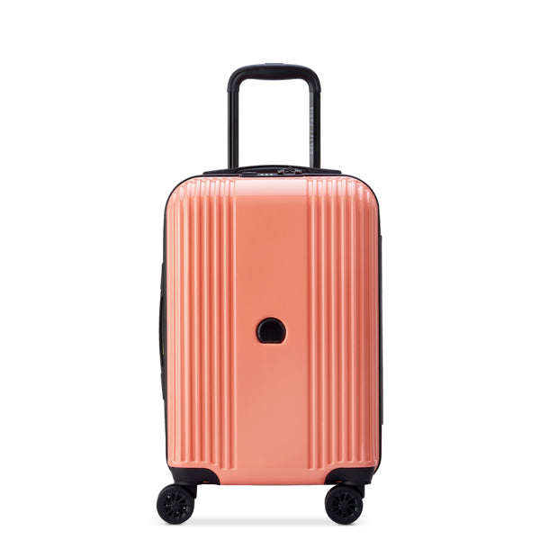 Delsey logo detail on coral pink hardside shell