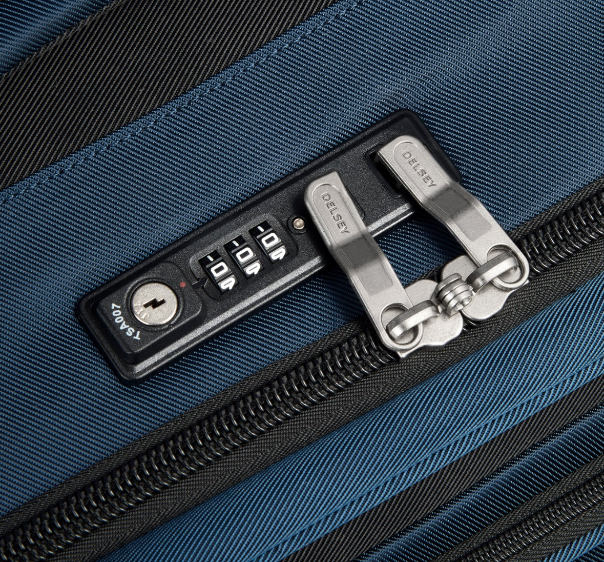 TSA combination lock on a blue Delsey luggage bag