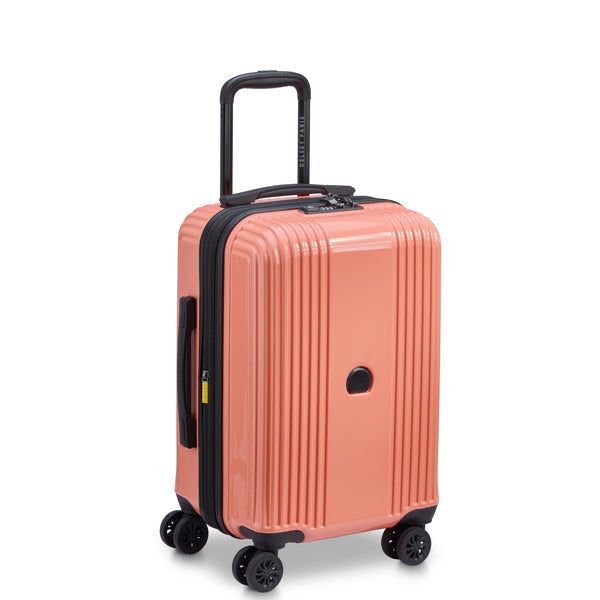 Built-in TSA combination lock on coral Delsey luggage