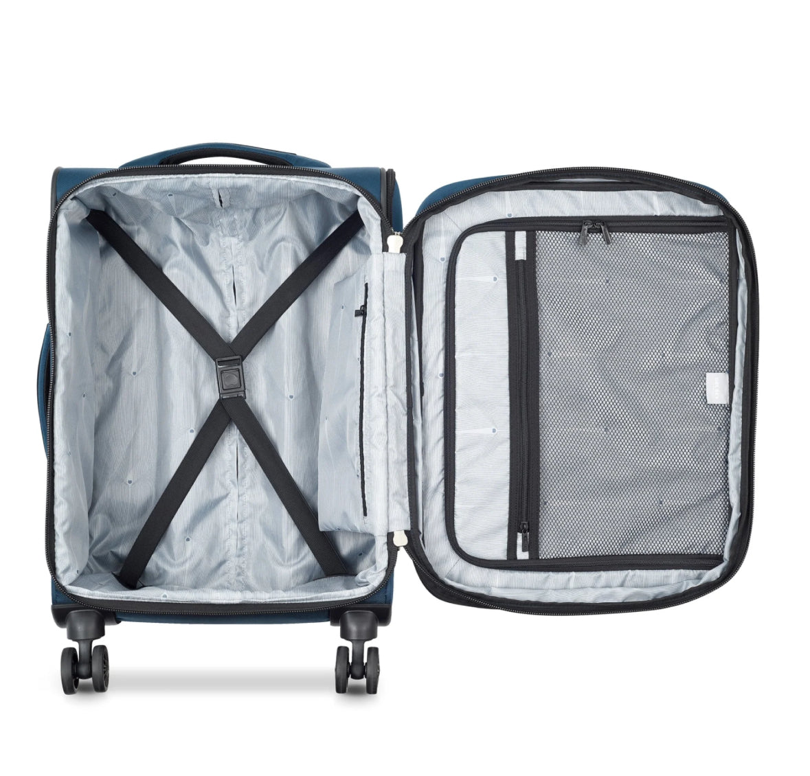 Open interior of a blue Delsey suitcase with tie-down straps